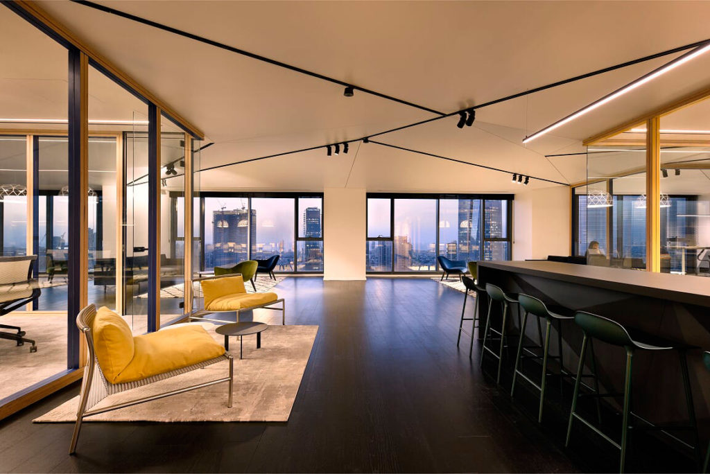 Triangular ceilings in office — Saros Design